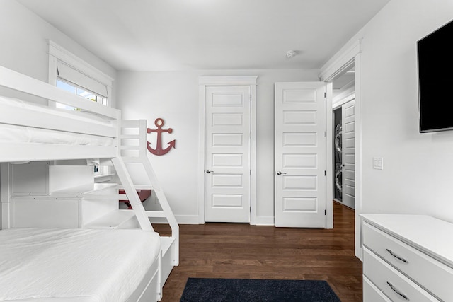 bedroom featuring dark hardwood / wood-style flooring