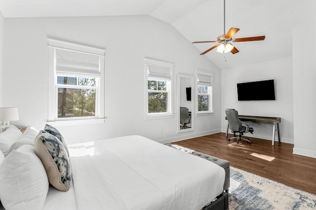 bedroom with lofted ceiling, wood-type flooring, and ceiling fan