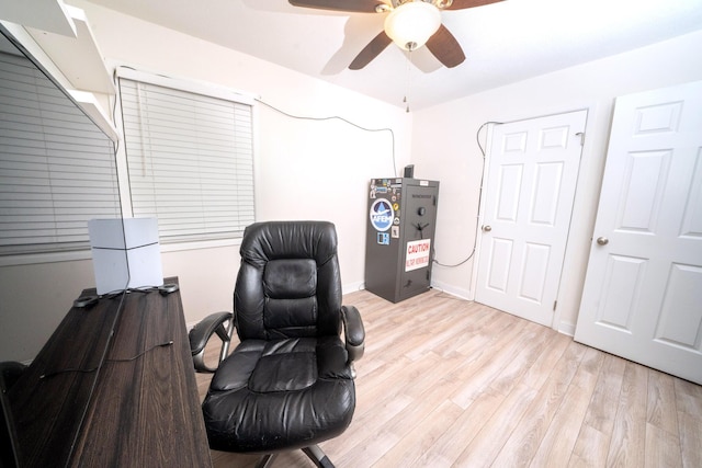 office area with ceiling fan and light wood-type flooring