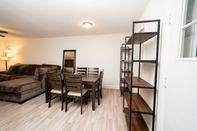 dining room with light wood-type flooring