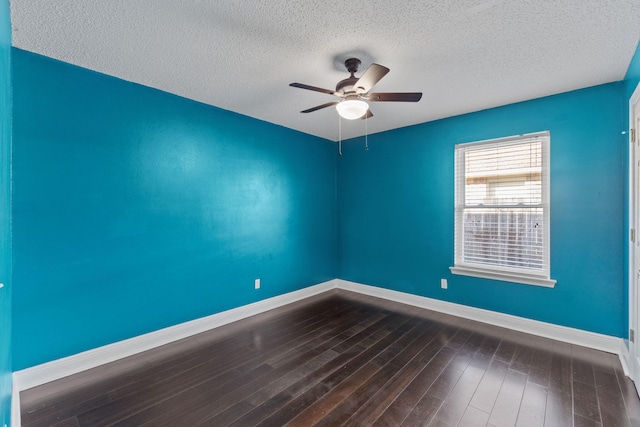 unfurnished room with ceiling fan, a textured ceiling, and hardwood / wood-style flooring