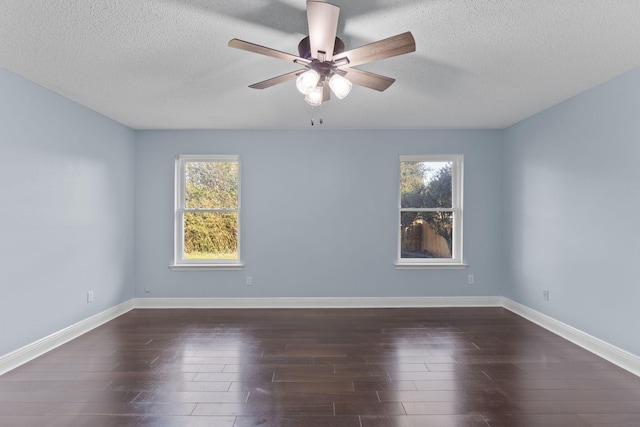 unfurnished room with a textured ceiling, ceiling fan, and dark hardwood / wood-style floors