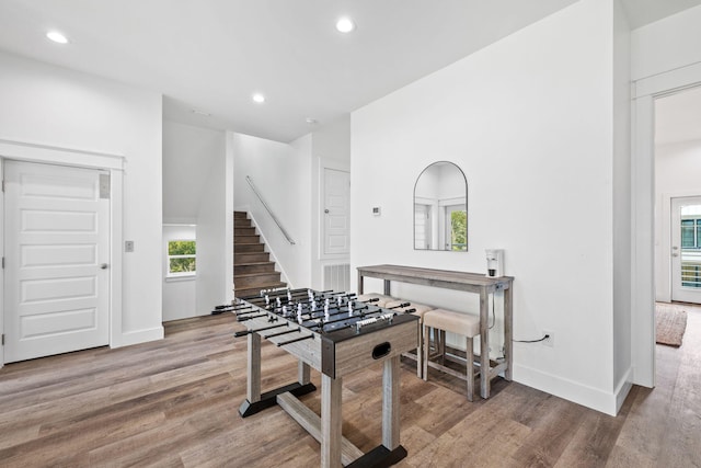 playroom with hardwood / wood-style floors and a wealth of natural light