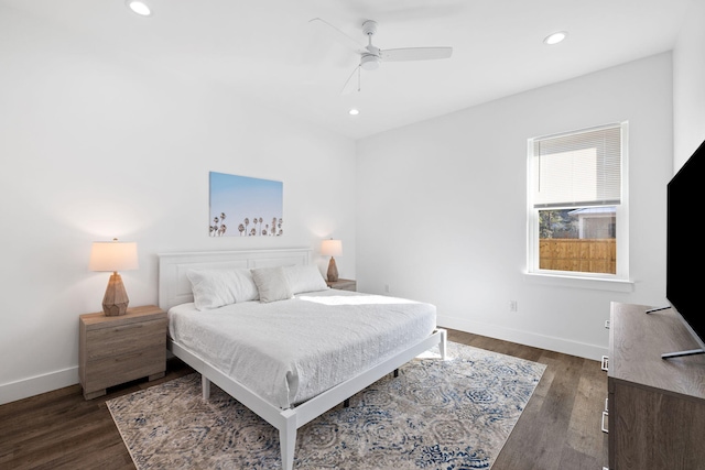 bedroom featuring ceiling fan and dark wood-type flooring