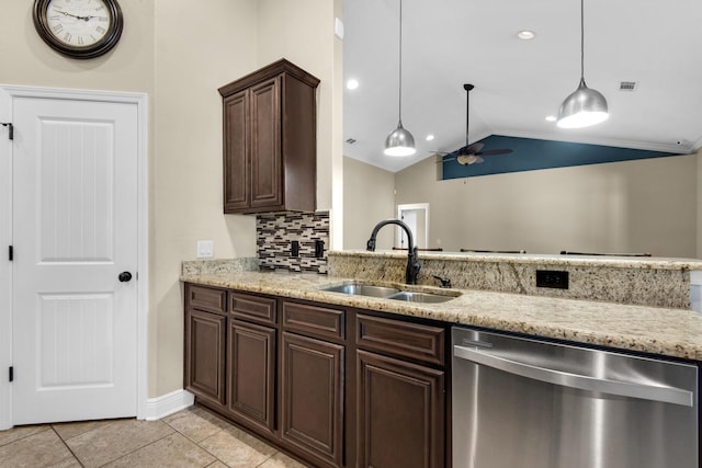 kitchen featuring stainless steel dishwasher, vaulted ceiling, decorative backsplash, ceiling fan, and sink