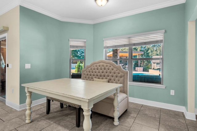 dining room featuring ornamental molding