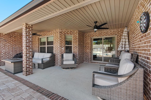 view of patio / terrace featuring ceiling fan and an outdoor hangout area