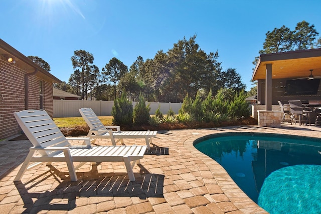 view of swimming pool featuring a patio