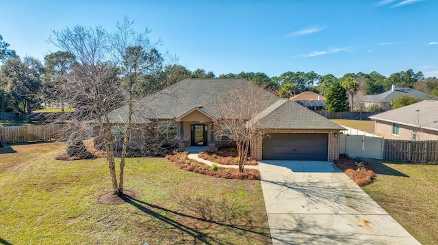 single story home featuring a front yard and a garage