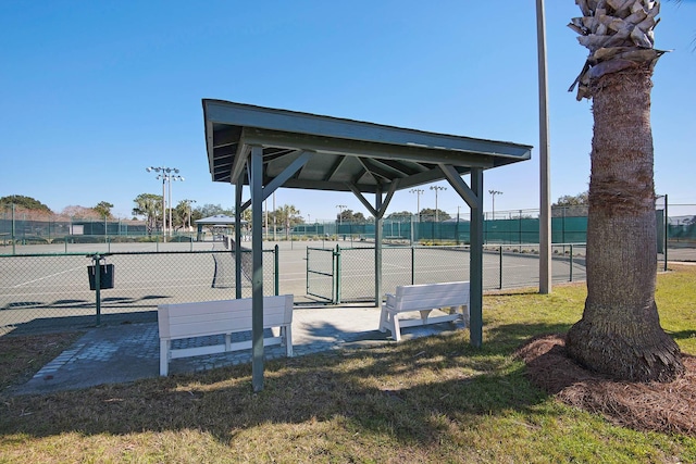 view of property's community with a gazebo and a yard