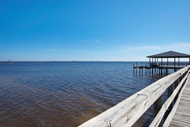 view of dock with a water view