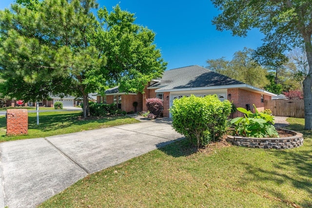 single story home featuring a garage and a front lawn