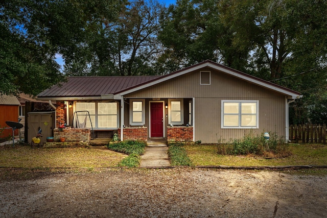 ranch-style home with a porch