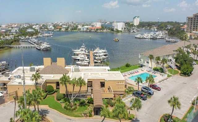 birds eye view of property with a water view