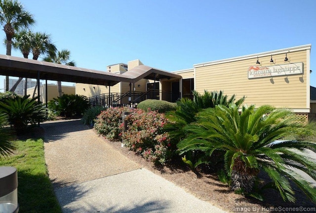 view of front of home featuring a carport