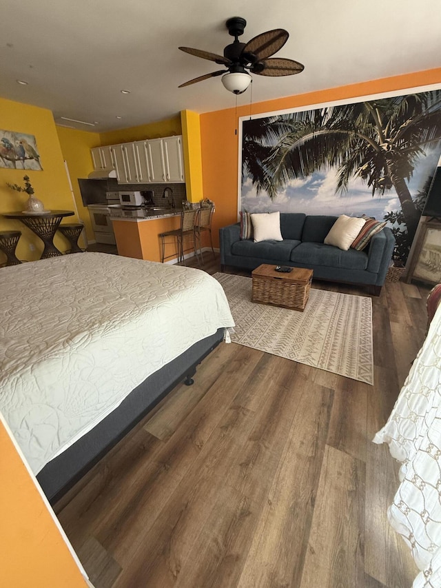 775 Gulf Shore Dr Unit 8224, Destin, FL 32541 - bedroom with a sink and dark wood-style flooring