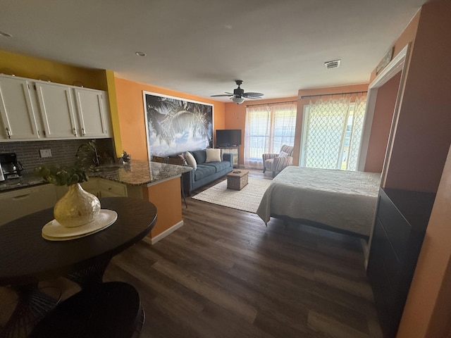 775 Gulf Shore Dr Unit 8224, Destin, FL 32541 - bedroom with ceiling fan, dark wood-style flooring, and visible vents