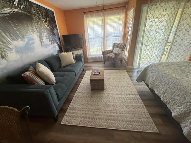 775 Gulf Shore Dr Unit 8224, Destin, FL 32541 - bedroom with baseboards and wood finished floors