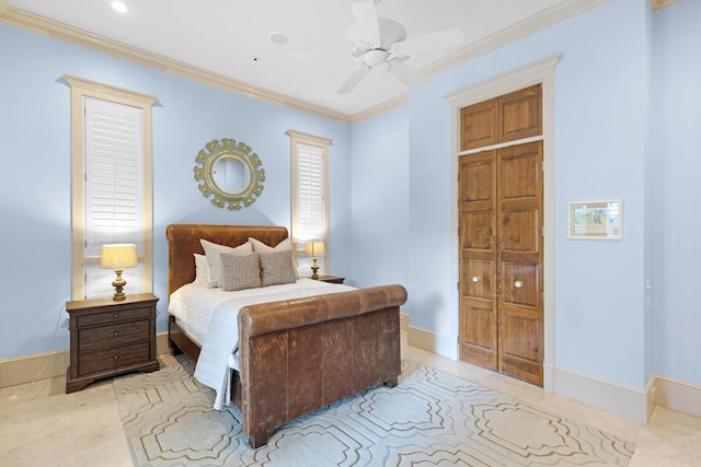 bedroom with ceiling fan and crown molding