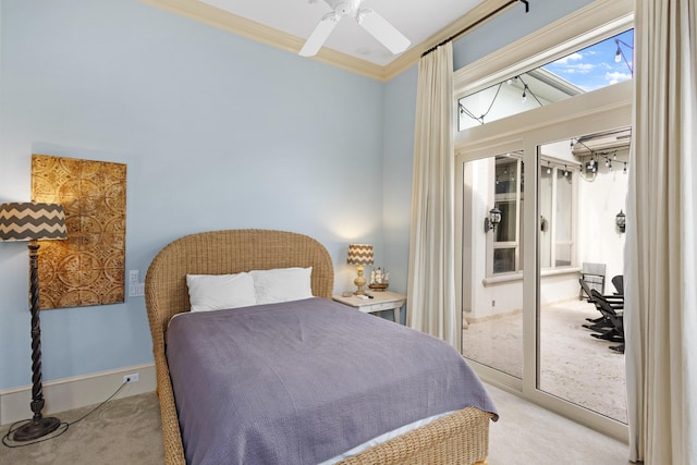 carpeted bedroom with ceiling fan and crown molding