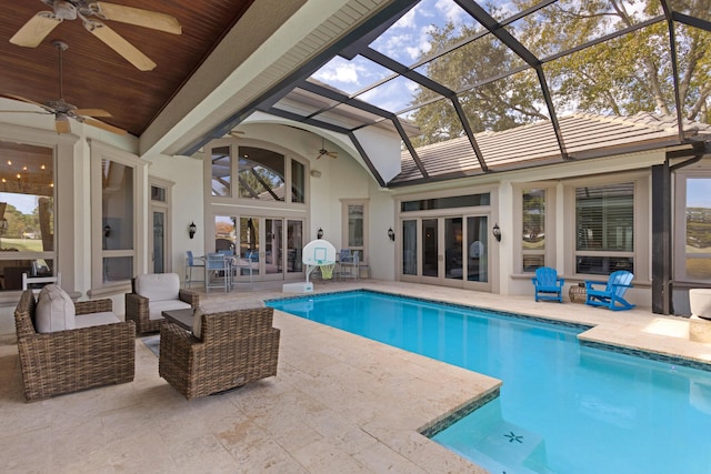 view of pool featuring ceiling fan, outdoor lounge area, french doors, and a patio