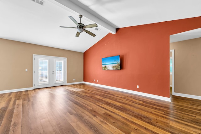 spare room with french doors, wood finished floors, visible vents, and baseboards