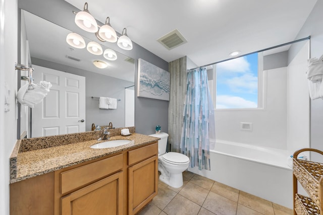 full bathroom with toilet, tile patterned floors, vanity, and shower / tub combo with curtain