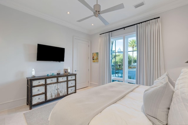 bedroom featuring ornamental molding and ceiling fan