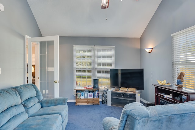 carpeted living room with lofted ceiling and ceiling fan