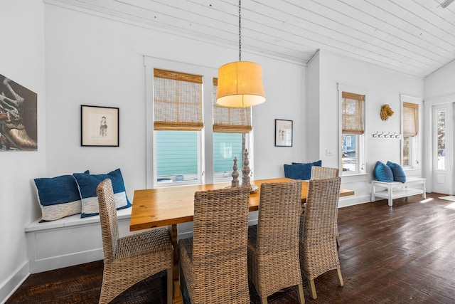 dining room with wooden ceiling and dark hardwood / wood-style floors