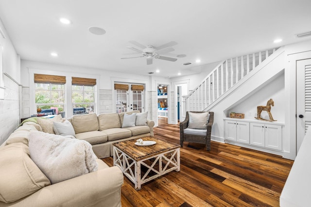 living room with dark hardwood / wood-style floors, ceiling fan, and french doors