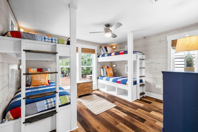 bedroom featuring hardwood / wood-style floors and ceiling fan