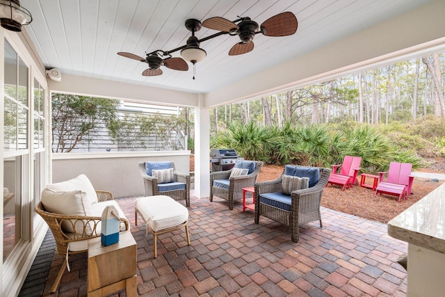 view of patio / terrace featuring ceiling fan and an outdoor hangout area