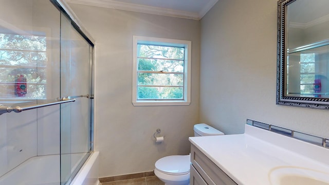 full bathroom with toilet, shower / bath combination with glass door, tile patterned floors, ornamental molding, and vanity