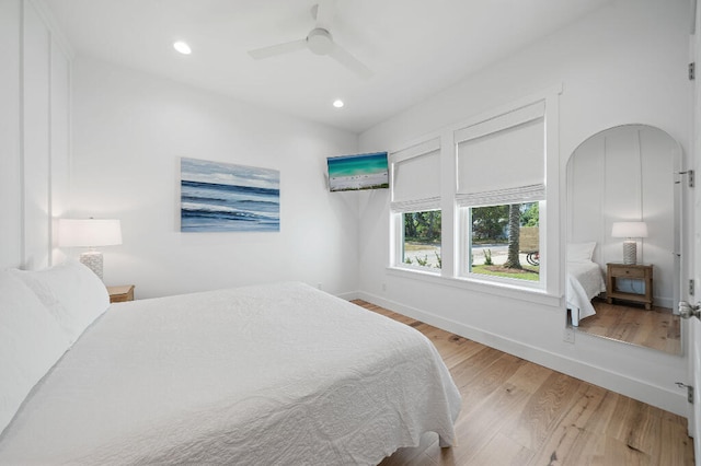 bedroom with light wood-style floors, recessed lighting, baseboards, and ceiling fan