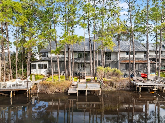 view of dock with a water view