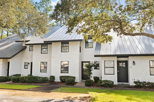 view of property with a front yard