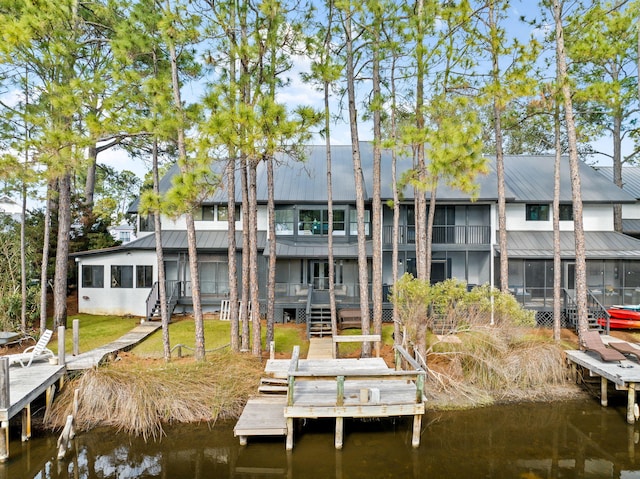 dock area with a water view