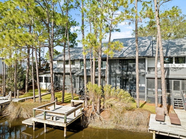 dock area with a water view