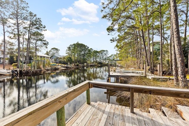 view of dock with a water view