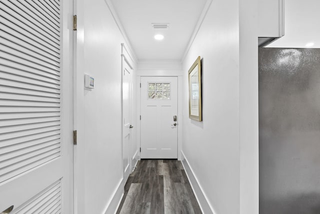 hallway with dark hardwood / wood-style floors