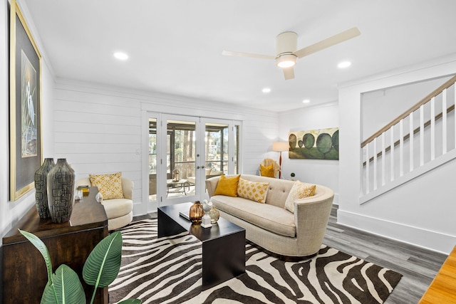 living room with french doors, ceiling fan, and hardwood / wood-style flooring