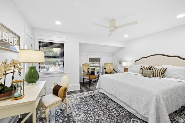 bedroom with ceiling fan and dark hardwood / wood-style floors