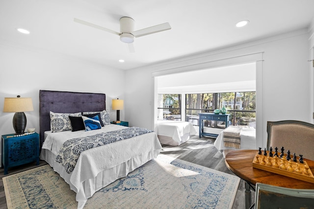 bedroom featuring ceiling fan and dark hardwood / wood-style floors