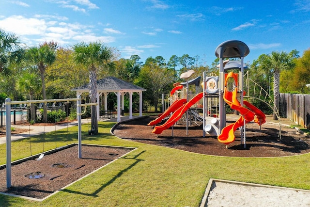 view of jungle gym with a gazebo and a lawn