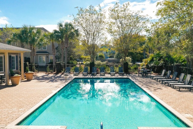 view of pool featuring a patio area