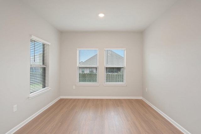 empty room with light wood-type flooring