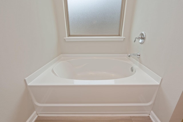 bathroom with a bathing tub