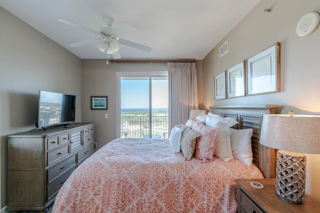 bedroom featuring ceiling fan and access to exterior