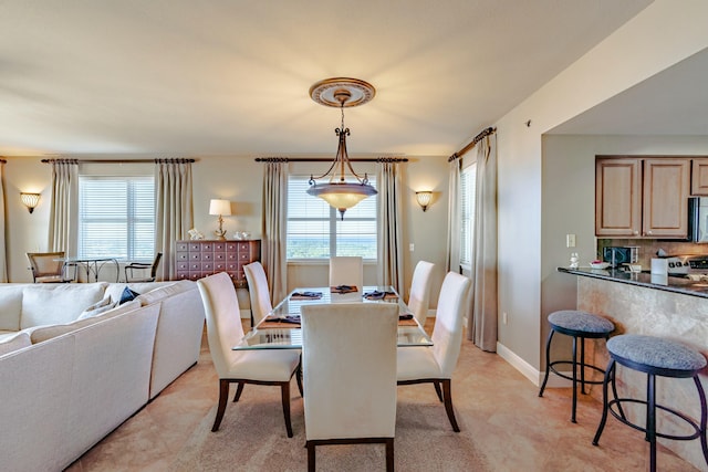 dining space with a wealth of natural light